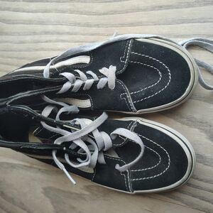 Vans Black and White Sneakers with Classic Skate Design